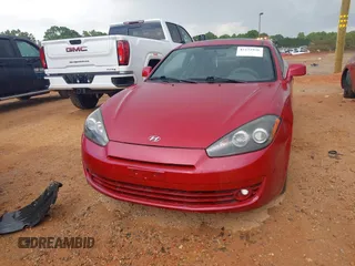 2008 Hyundai Tiburon GS z VIN KMHHM66D68U277885, wystawiony jako IAAI lot #42172920 z przebiegiem 205 023 mil mil oraz . Historia ofert i sprzedaży dostępna na DreamBid. Obrazek 12.