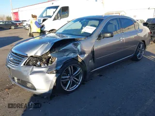 2006 Infiniti M z VIN JNKAY01E56M107083, wystawiony jako IAAI lot #41443347 z przebiegiem 162 191 mil mil oraz . Historia ofert i sprzedaży dostępna na DreamBid. Obrazek 17.