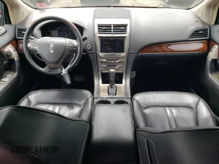 2015 Lincoln MKX with VIN 2LMDJ8JK4FBL24301, listed as a Copart auction lot 57666554 with 141,450 mi miles. Bid and sale history available at carsss.com. Image 8.