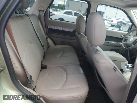2009 Mercury Mariner Hybrid with VIN 4M2CU29399KJ17064, listed as a Copart auction lot 60263545 with 176,232 mi miles and Salvage title. Bid and sale history available at DreamBid. Image 11.