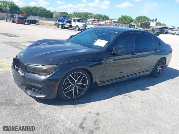 2016 BMW 7 Series 740i with VIN WBA7E2C51GG738889, listed as a IAAI auction lot 41838071 with 49,649 mi miles. Bid and sale history available at carsss.com. Image 2.