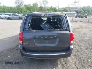 2017 Dodge Grand Caravan SE Plus z VIN 2C4RDGBGXHR549334, wystawiony jako IAAI lot #42097288 z przebiegiem 60 896 mil mil oraz . Historia ofert i sprzedaży dostępna na DreamBid. Obrazek 16.