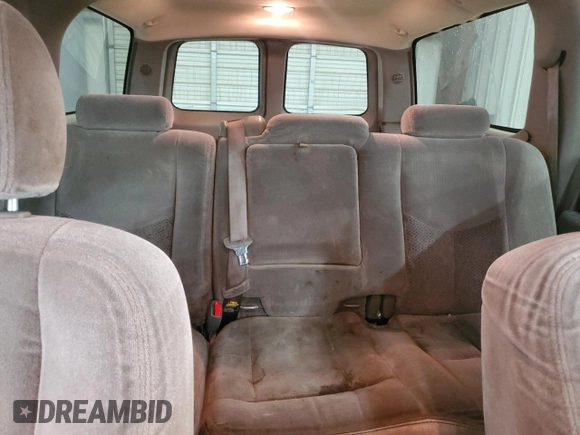 2003 Chevrolet Suburban LT z VIN 1GNFK16Z93J165597, wystawiony jako Copart lot #52101725 z przebiegiem 285 014 mil mil oraz Szkoda całkowita • Salvage title. Historia ofert i sprzedaży dostępna na DreamBid. Obrazek 10.