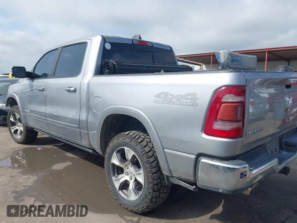 2019 Ram 1500 Laramie with VIN 1C6SRFJT8KN686506, listed as a IAAI auction lot 42499382 with 145,287 mi miles and . Bid and sale history available at DreamBid. Image 3.