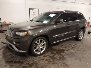 2015 Jeep Grand Cherokee Summit with VIN 1C4RJFJG4FC634129, listed as a IAAI auction lot 42481877 with 149,087 mi miles and . Bid and sale history available at DreamBid. Image 2.