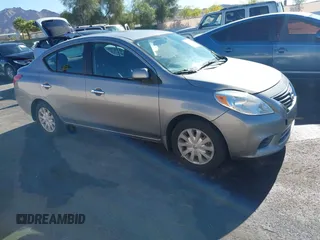 2012 Nissan Versa SV with VIN 3N1CN7AP0CL921230, listed as a IAAI auction lot 42151993 with 184,676 mi miles. Bid and sale history available at carsss.com. Image 1.