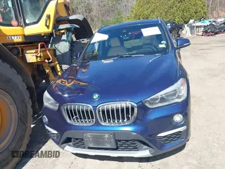 2017 BMW X1 xDrive28i with VIN WBXHT3C33H5F82035, listed as a IAAI auction lot 41944399 with 102,942 mi miles. Bid and sale history available at carsss.com. Image 12.