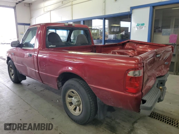 2001 Ford Ranger XL with VIN 1FTYR10C61TA40124, listed as a Copart auction lot 48943325 with 196,810 mi miles and Salvage title. Bid and sale history available at DreamBid. Image 2.