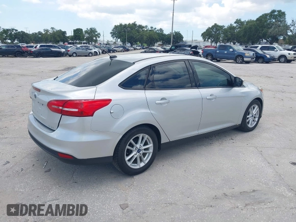 2015 Ford Focus SE with VIN 1FADP3F27FL215315, listed as a IAAI auction lot 42716234 with 118,645 mi miles and . Bid and sale history available at DreamBid. Image 4.
