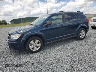 2013 Dodge Journey SE z VIN 3C4PDCAB5DT686890, wystawiony jako Copart lot #58940995 z przebiegiem 148 382 mil mil oraz Czysty tytuł • Clean title. Historia ofert i sprzedaży dostępna na DreamBid. Obrazek 1.