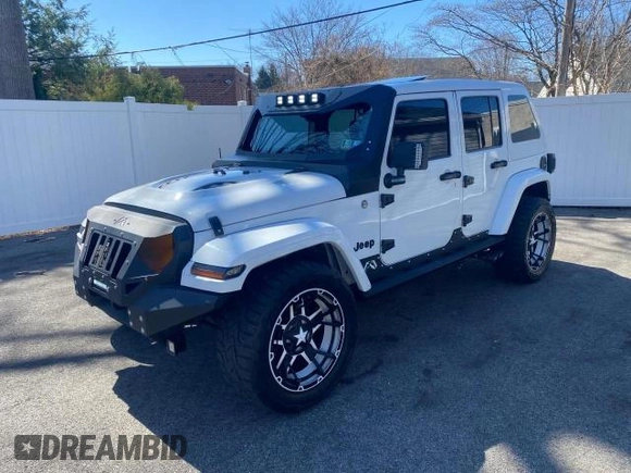 2014 Jeep Wrangler Unlimited Sahara with VIN 1C4BJWEG1EL272951, listed as a Copart auction lot 51147245 with 56,989 mi miles and Clean Title. Bid and sale history available at carsss.com. Image 2.