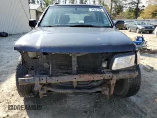 2000 Isuzu Rodeo S with VIN 4S2CK58W7Y4309261, listed as a Copart auction lot 54000775 with 187,949 mi miles and Salvage title. Bid and sale history available at DreamBid. Image 5.