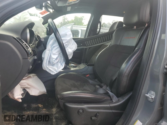 2020 Jeep Grand Cherokee Trailhawk with VIN 1C4RJFLG9LC263039, listed as a Copart auction lot 60395755 with 62,886 mi miles and Clean title. Bid and sale history available at DreamBid. Image 7.
