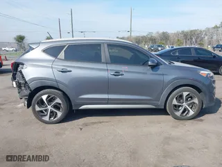 2017 Hyundai Tucson Value with VIN KM8J33A24HU281183, listed as a IAAI auction lot 41563886 with 71,110 mi miles. Bid and sale history available at carsss.com. Image 13.
