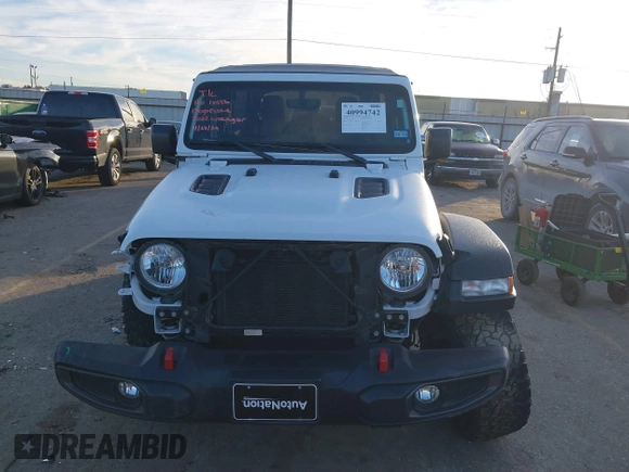 2022 Jeep Wrangler Unlimited Rubicon with VIN 1C4HJXFN4NW123803, listed as a IAAI auction lot 40994742 with 36,156 mi miles and . Bid and sale history available at DreamBid. Image 12.