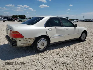 1999 Acura RL with VIN JH4KA9664XC004727, listed as a Copart auction lot 62120054 with 0 mi miles and Salvage Title. Bid and sale history available at carsss.com. Image 3.