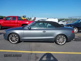 2013 Audi A5 Premium Plus z VIN WAULFAFH5DN009944, wystawiony jako IAAI lot #42508314 z przebiegiem 233 593 mil mil oraz . Historia ofert i sprzedaży dostępna na DreamBid. Obrazek 14.