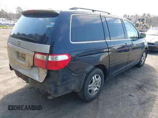 2005 Honda Odyssey EX-L with VIN 5FNRL38785B113074, listed as a IAAI auction lot 41907648 with 305,956 mi miles and . Bid and sale history available at DreamBid. Image 4.