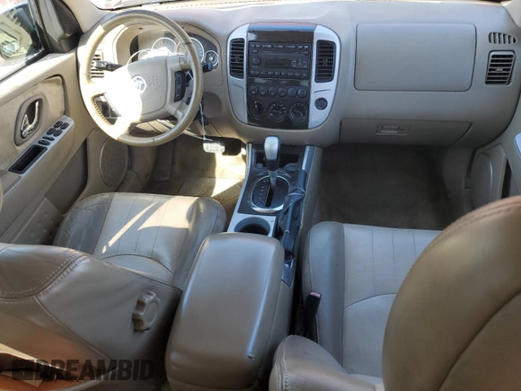 2005 Mercury Mariner Luxury with VIN 4M2YU57105DJ18837, listed as a Copart auction lot 52105545 with 177,049 mi miles and Salvage title. Bid and sale history available at DreamBid. Image 8.