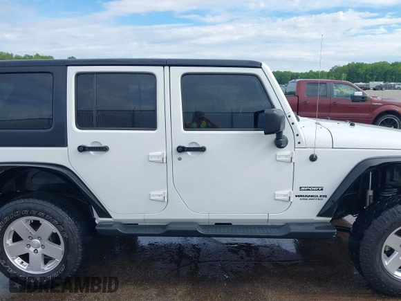 2013 Jeep Wrangler Unlimited Sport with VIN 1C4BJWDG4DL599151, listed as a IAAI auction lot 42212831 with 143,865 mi miles and . Bid and sale history available at DreamBid. Image 13.