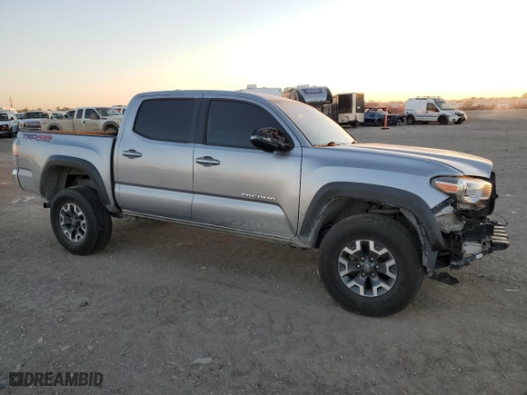 2021 Toyota Tacoma 4WD SR with VIN 3TMCZ5AN9MM415928, listed as a Copart auction lot 49777065 with 96,617 mi miles and Salvage Title. Bid and sale history available at carsss.com. Image 4.