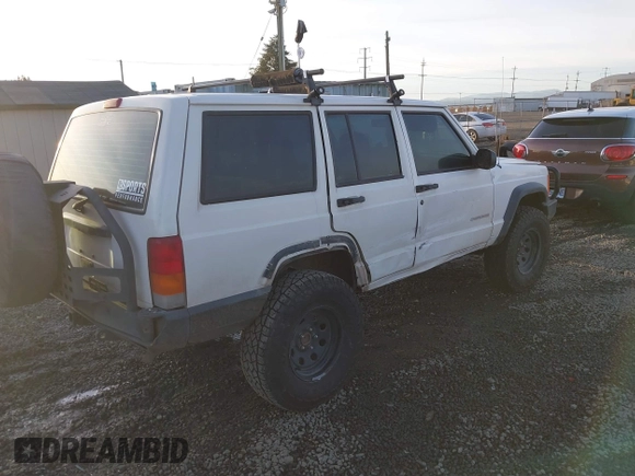 2000 Jeep Cherokee z VIN 1J4FF28P6YL132738, wystawiony jako IAAI lot #41382855 z przebiegiem 196 213 mil mil oraz . Historia ofert i sprzedaży dostępna na DreamBid. Obrazek 4.