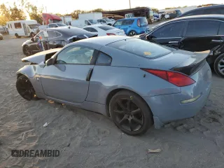 2004 Nissan 350Z Enthusiast with VIN JN1AZ34E74T063248, listed as a Copart auction lot 81887054 with 124,548 mi miles and Salvage Title. Bid and sale history available at DreamBid. Image 2.