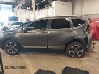 2018 Honda CR-V Touring with VIN 2HKRW2H91JH634457, listed as a IAAI auction lot 41697658 with 101,878 mi miles. Bid and sale history available at carsss.com. Image 15.