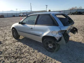 2001 Suzuki Swift GA z VIN 2S2AB21H516602339, wystawiony jako Copart lot #50135584 z przebiegiem 142 476 mil mil oraz Szkody całkowita. Historia ofert i sprzedaży dostępna na DreamBid. Obrazek 2.