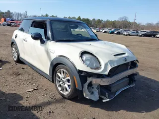 2014 MINI Hardtop S with VIN WMWXM7C57ET987122, listed as a IAAI auction lot 41780127 with 78,567 mi miles and . Bid and sale history available at DreamBid. Image 1.