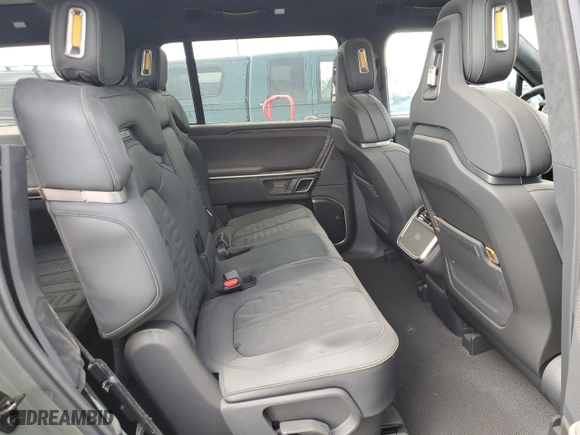 2023 Rivian R1S Launch Edition with VIN 7PDSGABL6PN022754, listed as a Copart auction lot 76849534 with 1,576 mi miles and Salvage Title. Bid and sale history available at carsss.com. Image 11.