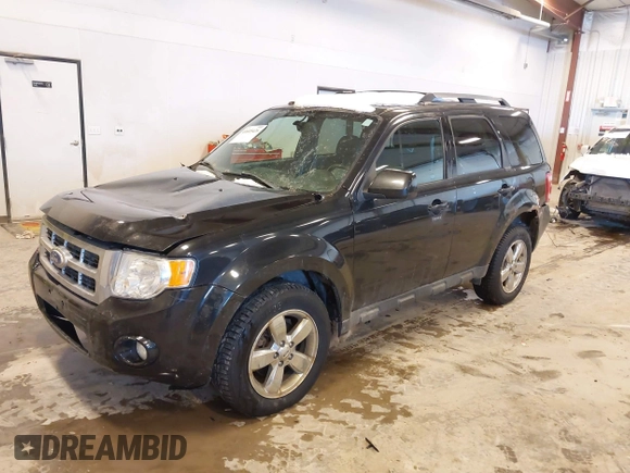 2011 Ford Escape Limited with VIN 1FMCU9EG0BKC29115, listed as a IAAI auction lot 41605426 with 189,187 mi miles. Bid and sale history available at carsss.com. Image 2.