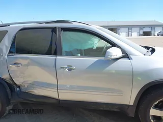 2010 GMC Acadia SLT1 z VIN 1GKLRMEDXAJ202687, wystawiony jako IAAI lot #40635219 z przebiegiem 115 810 mil mil oraz . Historia ofert i sprzedaży dostępna na DreamBid. Obrazek 13.