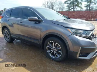2021 Honda CR-V EX with VIN 2HKRW1H59MH404256, listed as a IAAI auction lot 41711235 with 100,389 mi miles. Bid and sale history available at carsss.com. Image 1.