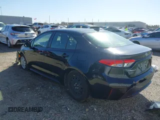 2021 Toyota Corolla Hybrid LE with VIN JTDEAMDE8MJ034218, listed as a IAAI auction lot 41692711 with 65,651 mi miles. Bid and sale history available at carsss.com. Image 3.