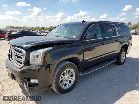 2016 GMC Yukon XL SLE with VIN 1GKS1FKC5GR252742, listed as a Copart auction lot 77618964 with 68,213 mi miles and Salvage Title. Bid and sale history available at carsss.com. Image 1.