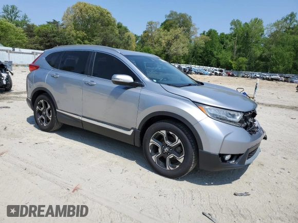 2018 Honda CR-V Touring with VIN 7FARW1H9XJE001467, listed as a Copart auction lot 55222005 with 65,611 mi miles and Salvage title. Bid and sale history available at DreamBid. Image 4.