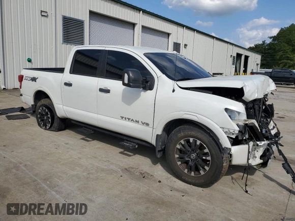 2019 Nissan Titan Pro-4X z VIN 1N6AA1E51KN526104, wystawiony jako Copart lot #51694335 z przebiegiem 56 620 mil mil oraz Szkoda całkowita • Salvage title. Historia ofert i sprzedaży dostępna na DreamBid. Obrazek 4.