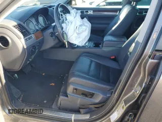 2010 Volkswagen Touareg VR6 with VIN WVGBF7A98AD001335, listed as a Copart auction lot 81735614 with 160,478 mi miles and Salvage Title. Bid and sale history available at DreamBid. Image 7.