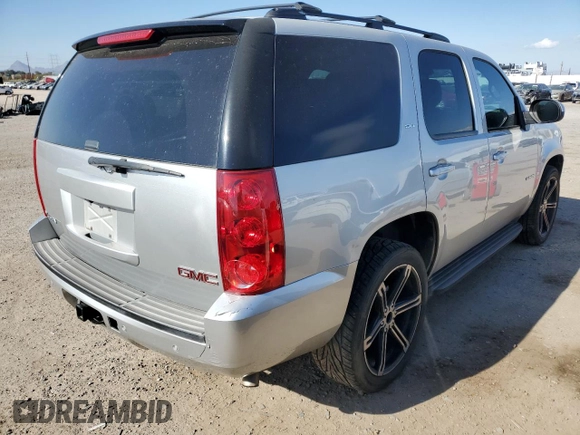 2014 GMC Yukon SLT with VIN 1GKS1CE00ER229897, listed as a Copart auction lot 88153085 with 213,106 mi miles and Salvage Title. Bid and sale history available at carsss.com. Image 3.