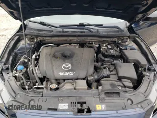 2015 Mazda 3 i SV z VIN JM1BM1T79F1263005, wystawiony jako Copart lot #52374195 z przebiegiem 58 186 mil mil oraz Czysty tytuł • Clean title. Historia ofert i sprzedaży dostępna na DreamBid. Obrazek 12.