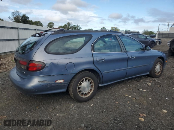 1999 Ford Taurus SE z VIN 1FAFP58S2XA261374, wystawiony jako Copart lot #74180494 z przebiegiem 193 416 mil mil oraz Szkody całkowita. Historia ofert i sprzedaży dostępna na DreamBid. Obrazek 3.