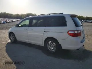 2005 Honda Odyssey EX-L with VIN 5FNRL38785B041017, listed as a Copart auction lot 52191965 with 211,949 mi miles and Salvage Title. Bid and sale history available at carsss.com. Image 2.