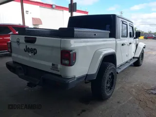 2021 Jeep Gladiator Willys with VIN 1C6HJTAG0ML505674, listed as a IAAI auction lot 42249317 with 60,150 mi miles and . Bid and sale history available at DreamBid. Image 4.