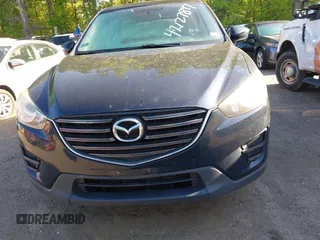 2016 Mazda CX-5 Sport with VIN JM3KE2BY3G0657904, listed as a IAAI auction lot 42127897 with 153,855 mi miles. Bid and sale history available at carsss.com. Image 12.
