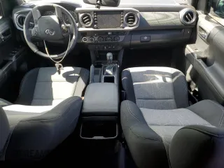 2023 Toyota Tacoma SR z VIN 3TYCZ5AN0PT156688, wystawiony jako Copart lot #51185145 z przebiegiem 4 868 mil mil oraz Szkoda całkowita • Salvage title. Historia ofert i sprzedaży dostępna na DreamBid. Obrazek 8.