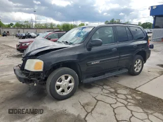 2003 GMC Envoy SLE z VIN 1GKDT13S432160651, wystawiony jako Copart lot #56938205 z przebiegiem 197 593 mil mil oraz Szkoda całkowita • Salvage title. Historia ofert i sprzedaży dostępna na DreamBid. Obrazek 1.