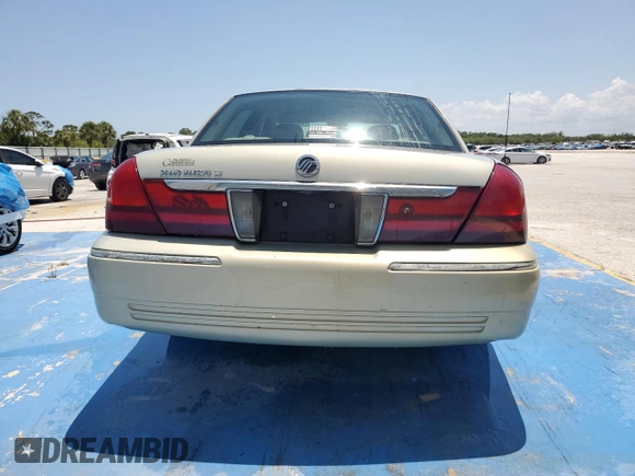 2005 Mercury Grand Marquis LS Premium z VIN 2MEFM75W45X636559, wystawiony jako Copart lot #54424415 z przebiegiem 129 643 mil mil oraz Szkoda całkowita • Salvage title. Historia ofert i sprzedaży dostępna na DreamBid. Obrazek 6.
