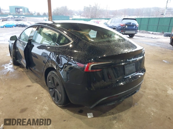 2025 Tesla Model 3 Long Range z VIN 5YJ3E1EA2SF909755, wystawiony jako IAAI lot #41667912 z przebiegiem 1 927 mil mil oraz . Historia ofert i sprzedaży dostępna na DreamBid. Obrazek 3.