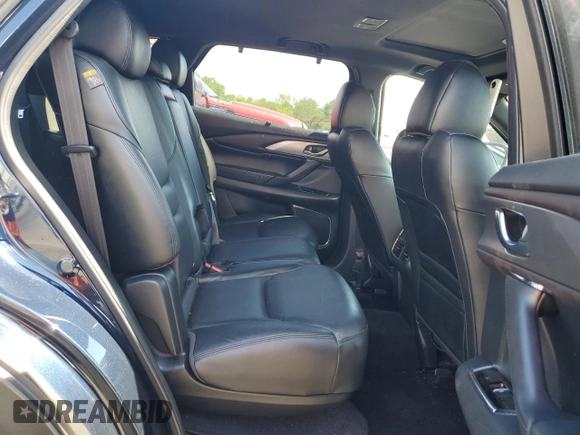 2017 Mazda CX-9 Grand Touring z VIN JM3TCBDY8H0131941, wystawiony jako Copart lot #56199685 z przebiegiem 166 080 mil mil oraz Szkoda całkowita • Salvage title. Historia ofert i sprzedaży dostępna na DreamBid. Obrazek 11.